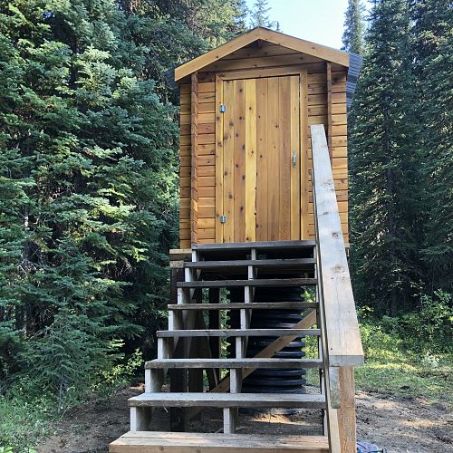 Cache Cabin outhouse